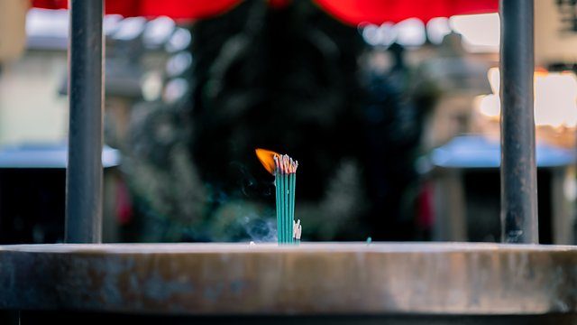 Candlelit incense shrine