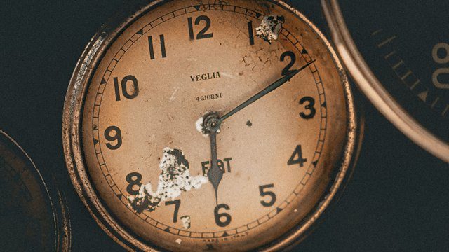 Weathered pocket watch
