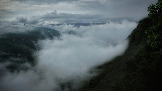 Clouds filling valley
