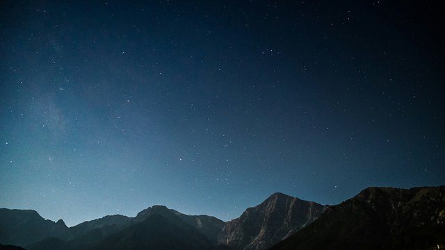 Starry sky mountain silhouette